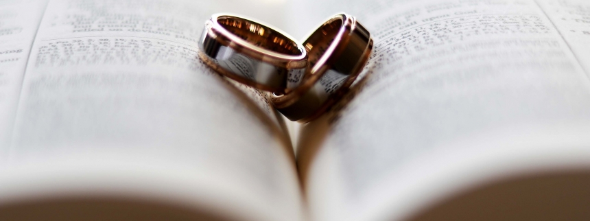 Wedding rings on Bible